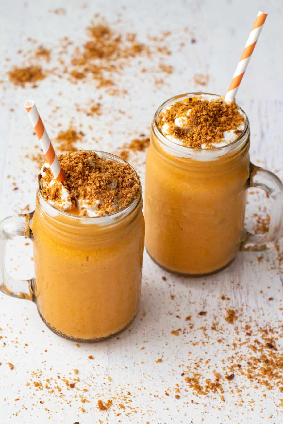 Carrot cake smoothie topped with whipped cream and toasted coconut. 