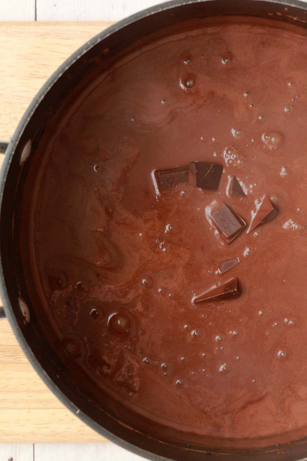 Chocolate ice cream mix in a pot. 