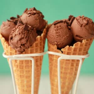 Vegan chocolate ice cream in cones.