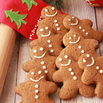 Vegan gingerbread cookies lined up in the shape of a Christmas tree