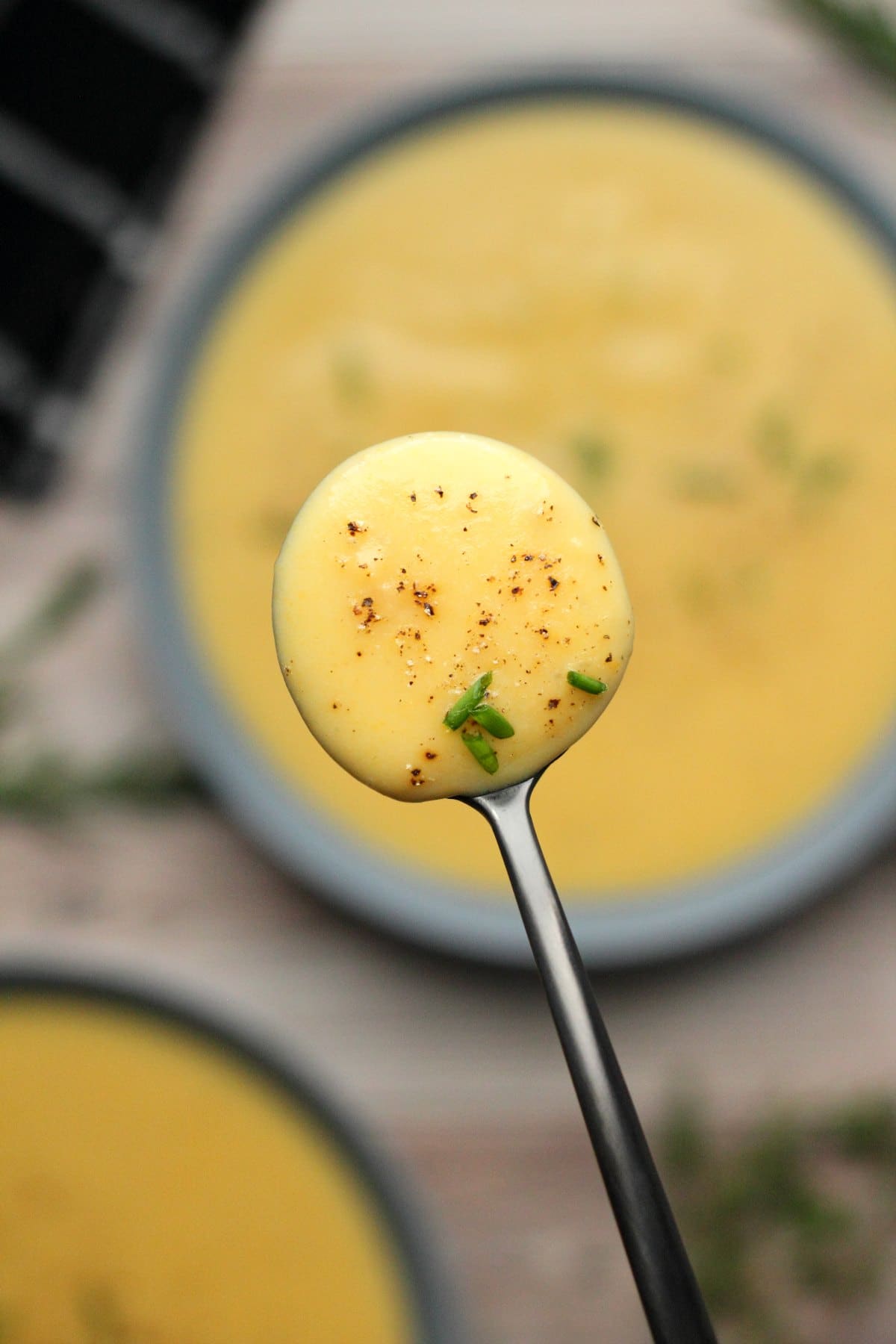 Spoonful of vegan potato soup. 