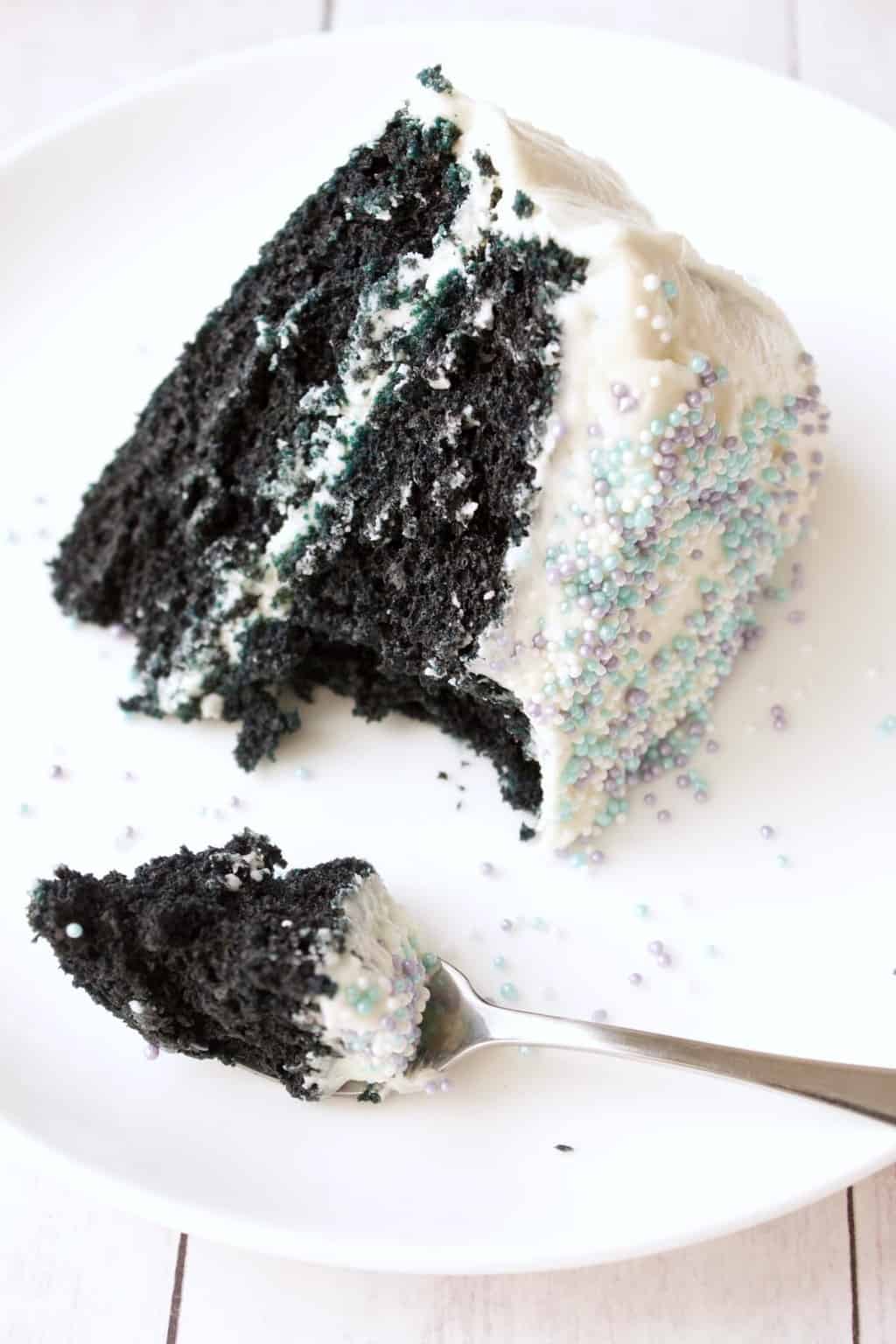Vegan Blue Velvet Cake. Midnight blue cake frosted with vegan vanilla frosting. Simple, moist and delicious! #vegan #lovingitvegan #dessert #cake #bluevelvet