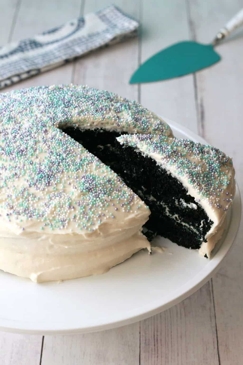 Vegan Blue Velvet Cake. Midnight blue cake frosted with vegan vanilla frosting. Simple, moist and delicious! #vegan #lovingitvegan #dessert #cake