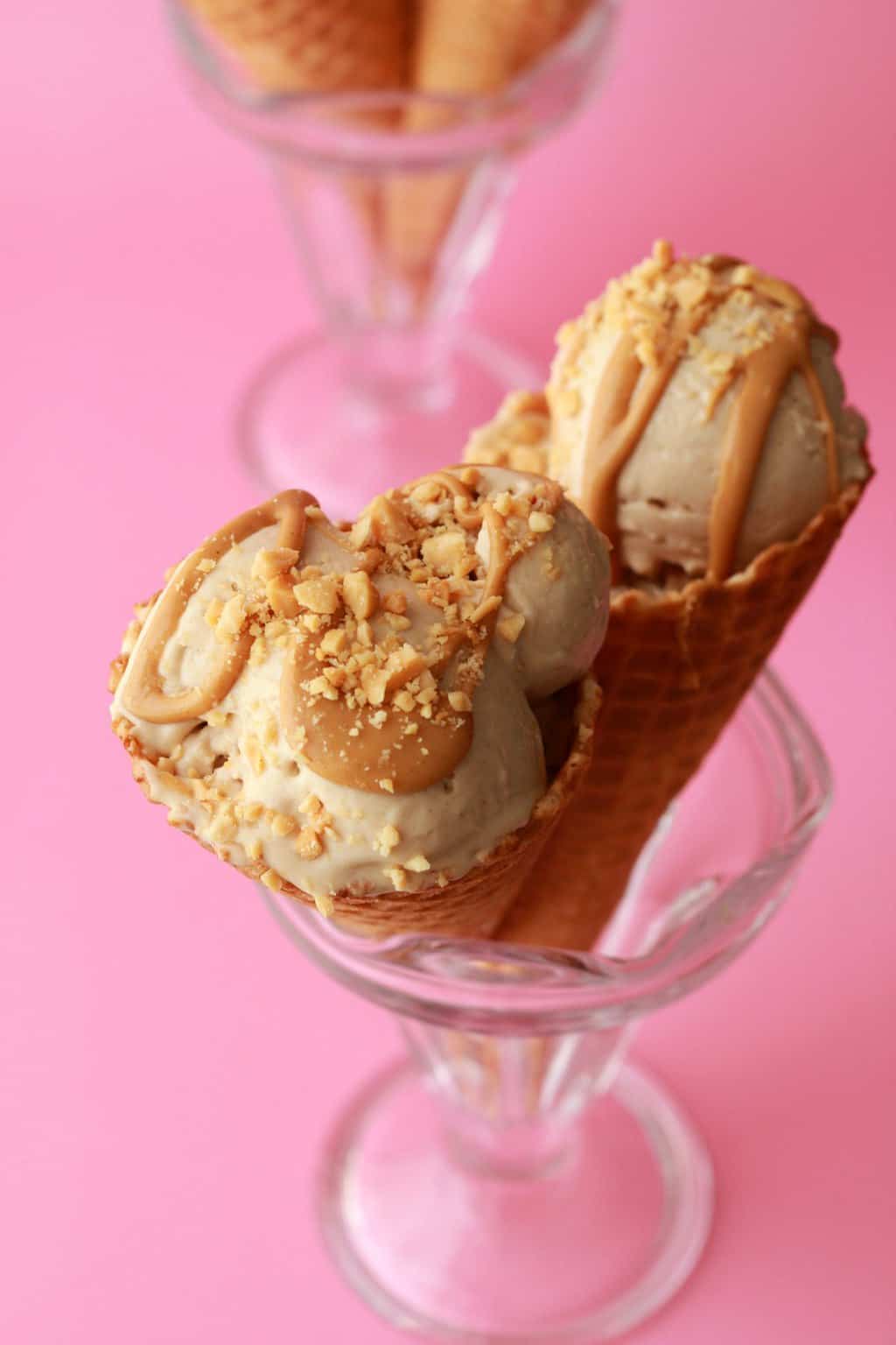 Peanut butter ice cream cones in sundae glasses. 