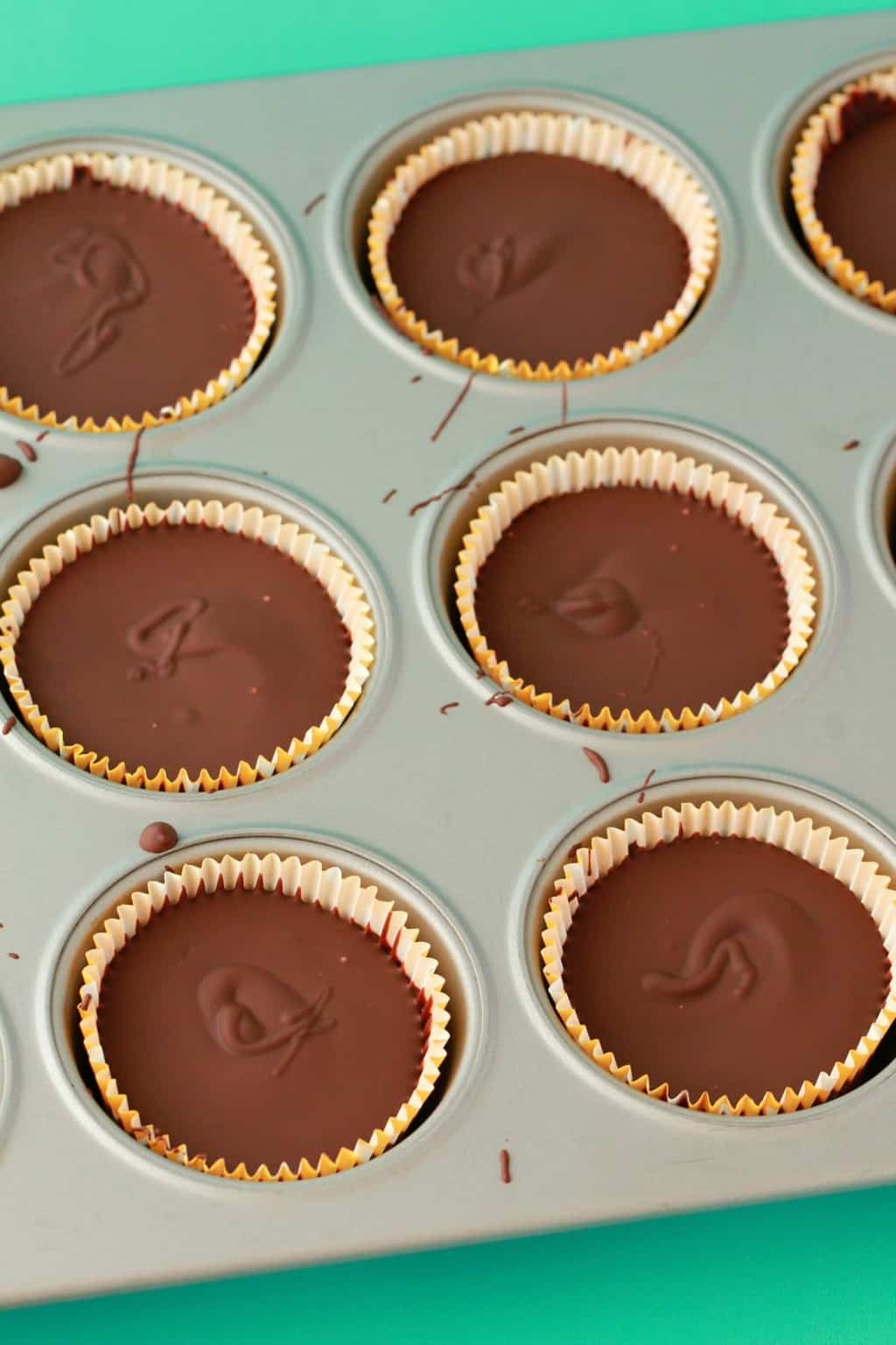 Almond butter cups in cupcake liners. 