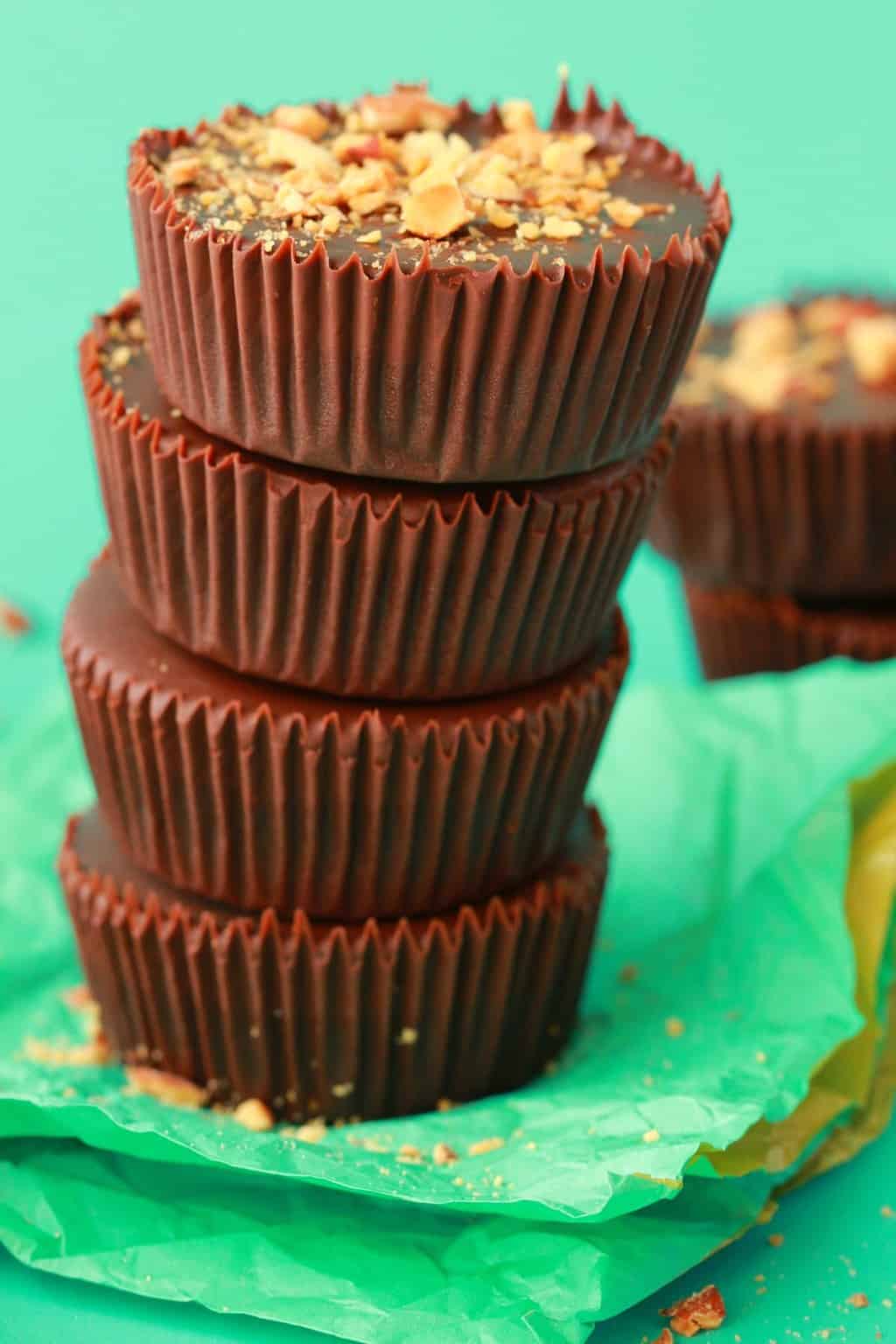 Almond butter cups in a stack. 
