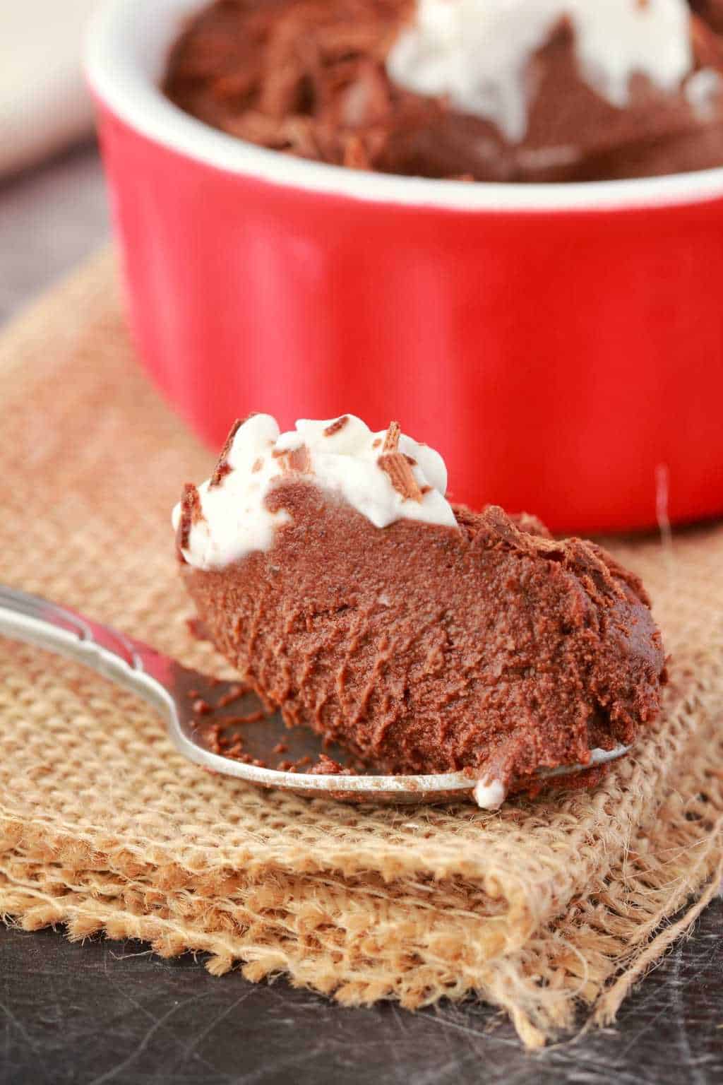 Spoonful of vegan chocolate mousse. 