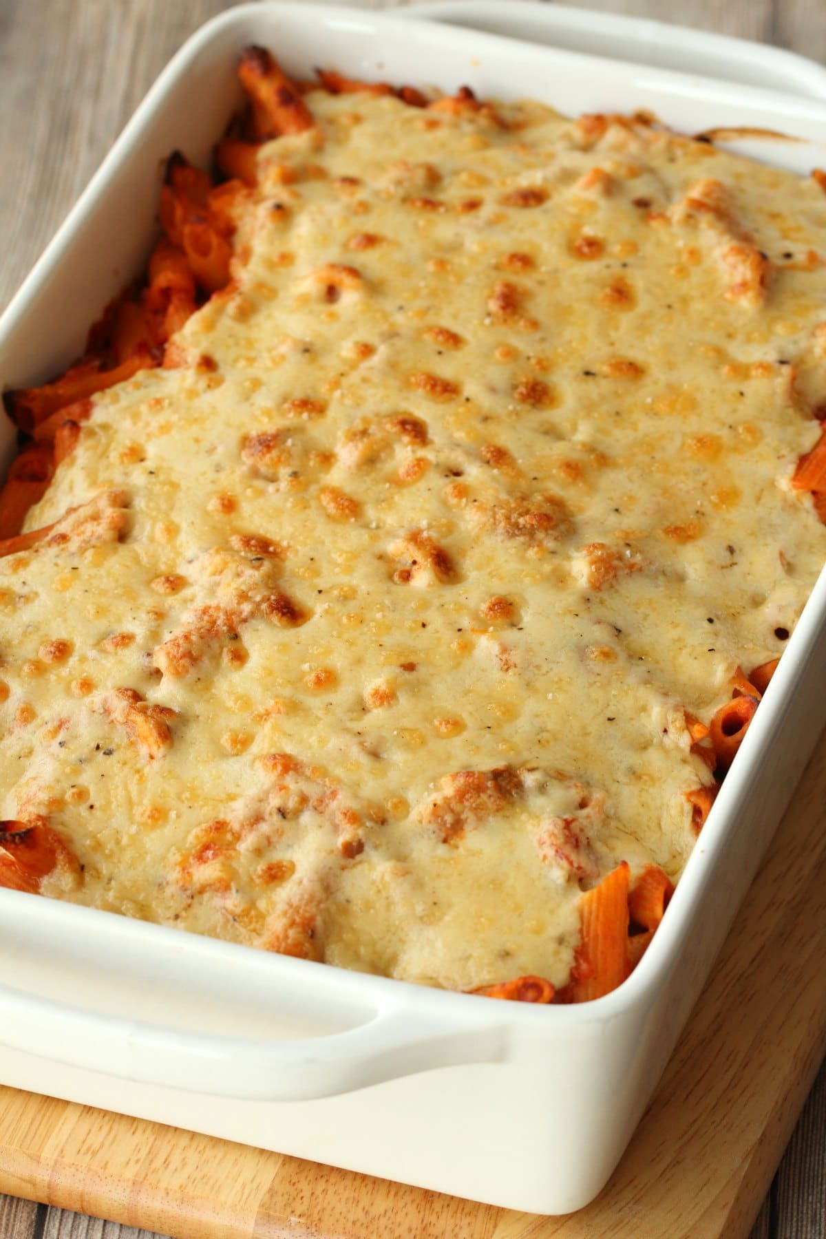 Vegan Pasta Bake straight from the oven in a white oven dish. 