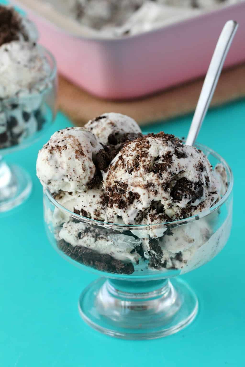 Vegan Cookies and Cream Ice Cream in a glass dish with a spoon. 