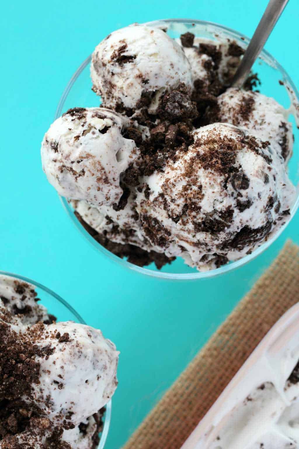 Vegan Cookies and Cream Ice Cream in a glass bowl with a spoon. 