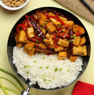 Kung pao tofu with rice in a skillet