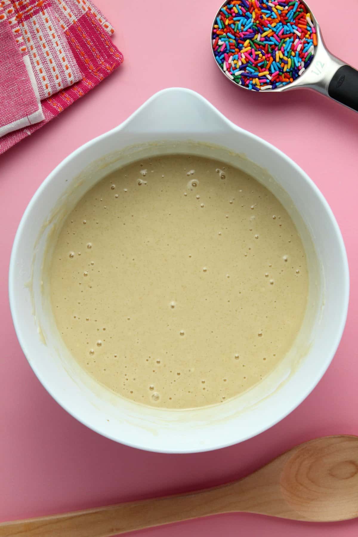 Cake batter in a mixing bowl. 