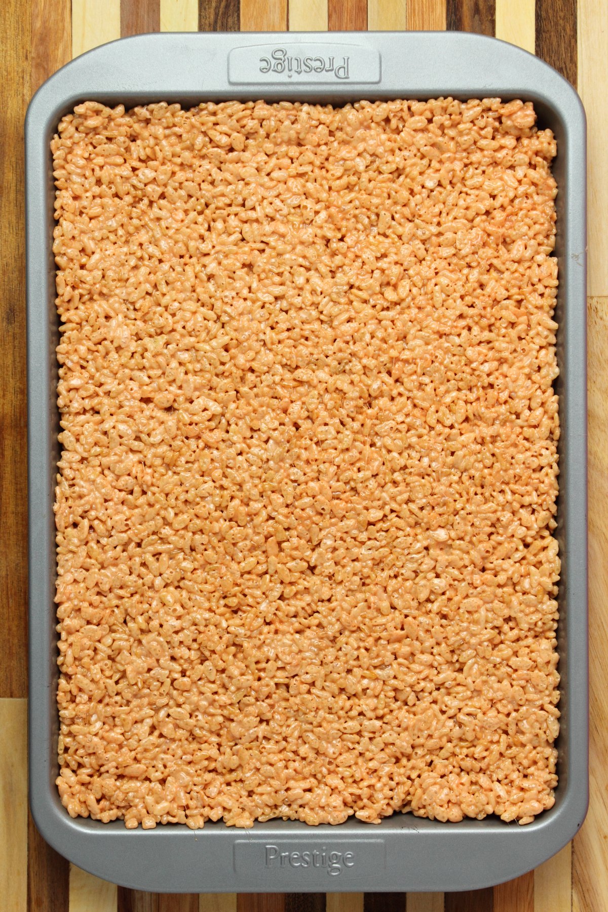 Rice krispie treats in a 9x13 baking sheet.