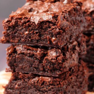 Vegan chocolate brownies in a stack.