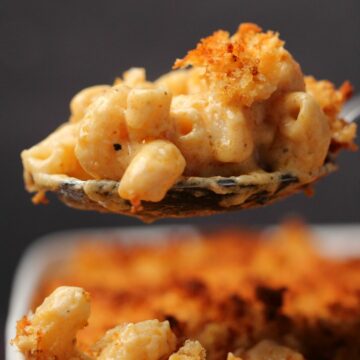 Serving spoonful of vegan mac and cheese.