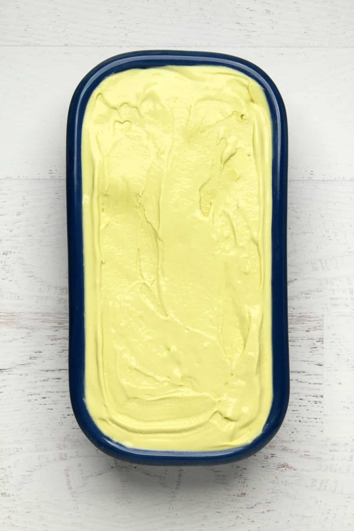 Avocado ice cream mix in a loaf pan.