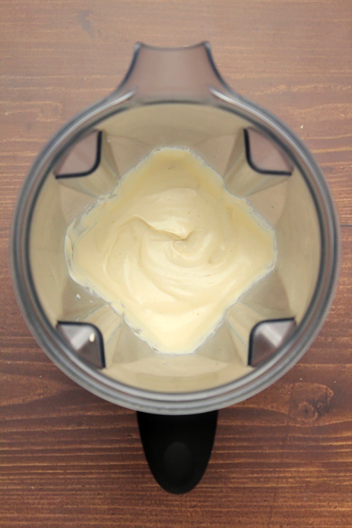 Blended vegan cream cheese in a blender jug.