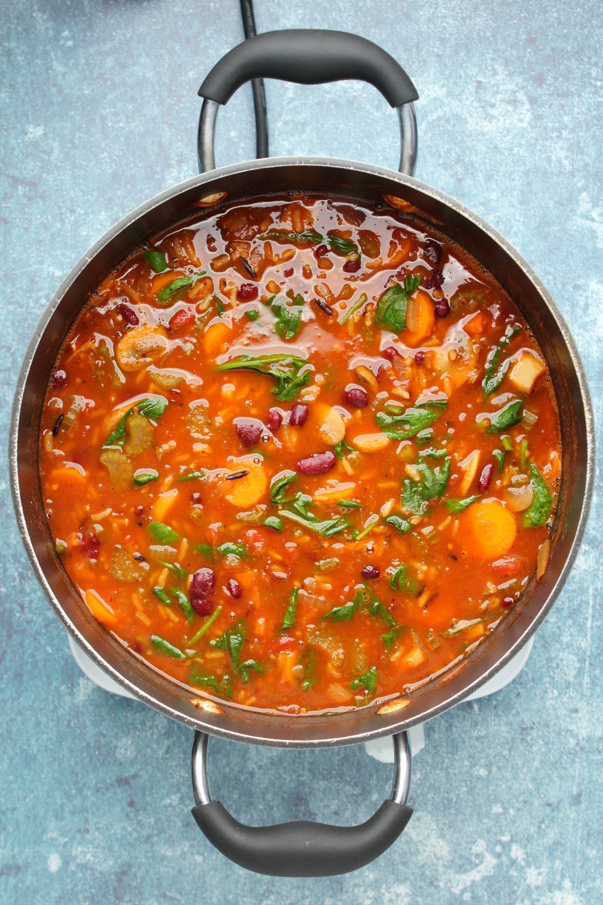 Vegan minestrone soup in a pot.