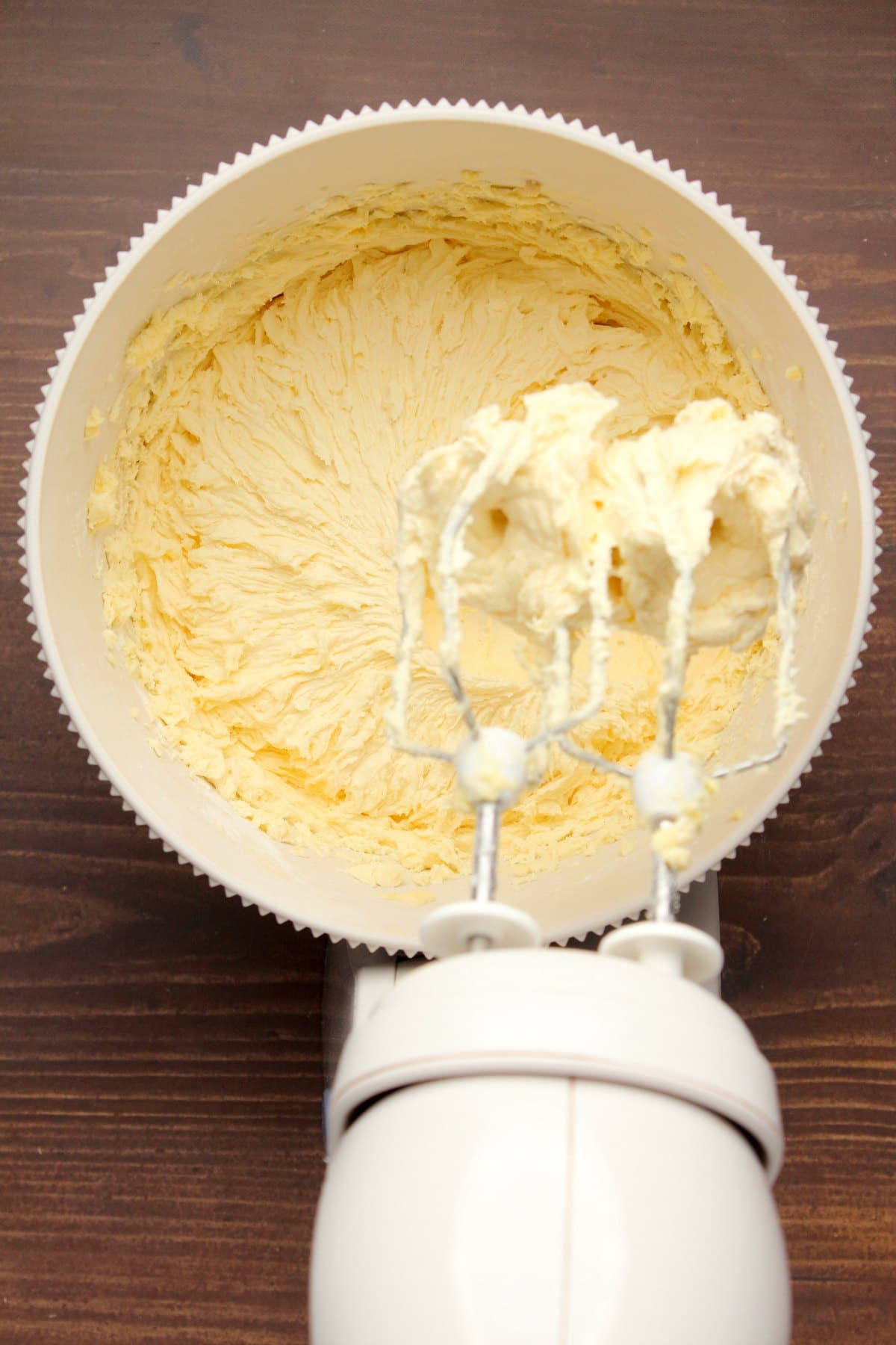 Vegan buttercream frosting in a stand mixer.