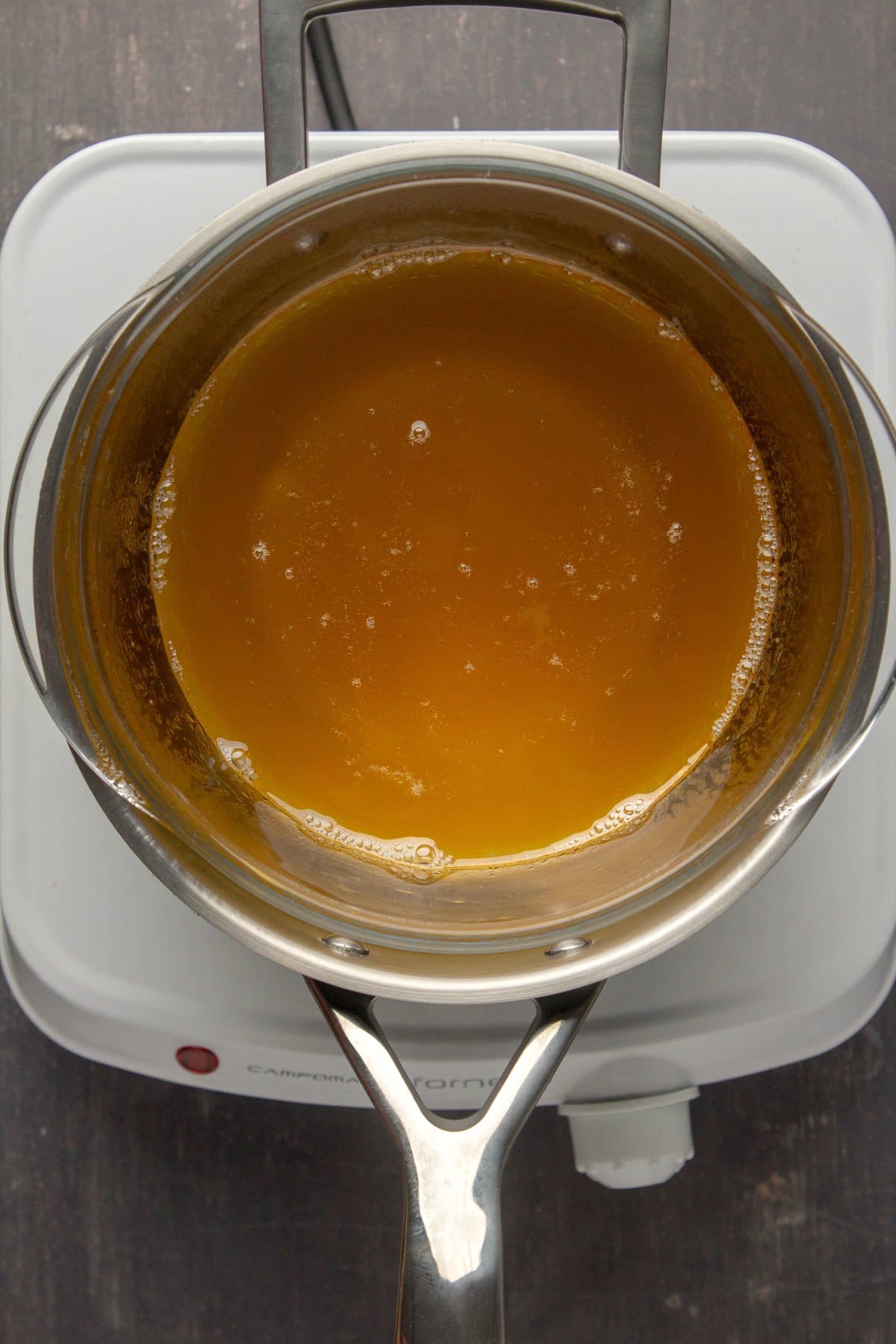Melted cacao butter in a homemade double boiler.