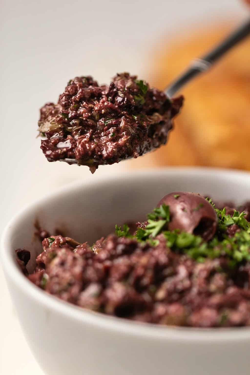 Spoonful of olive tapenade. 