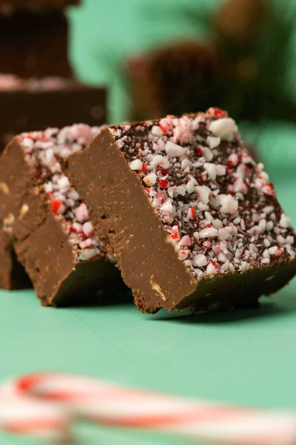 Vegan peppermint fudge topped with crushed candy canes. 
