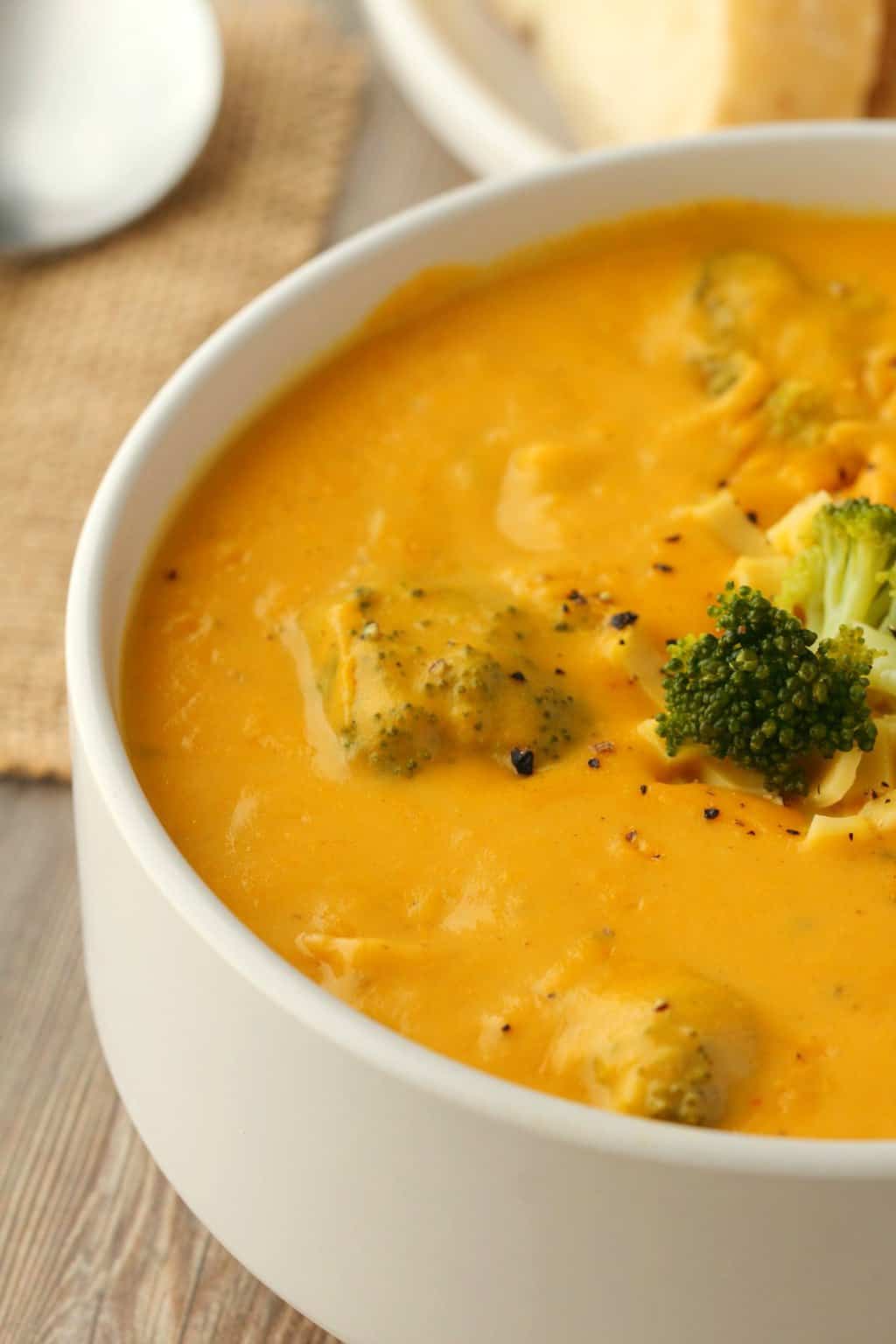 Vegan broccoli cheese soup in a white bowl. 