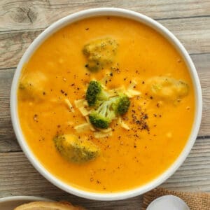 Vegan broccoli cheese soup in a white bowl.