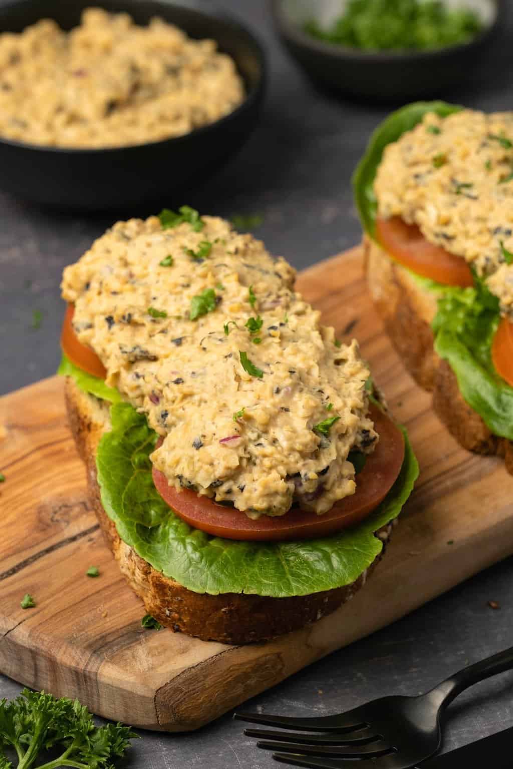 Vegan tuna on bread with lettuce and tomato. 