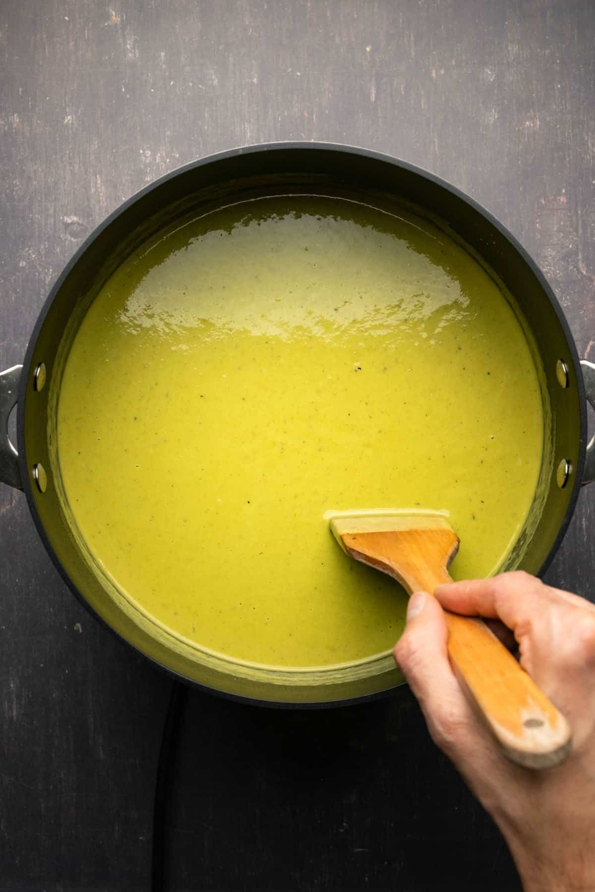 Vegan asparagus soup in a pot.