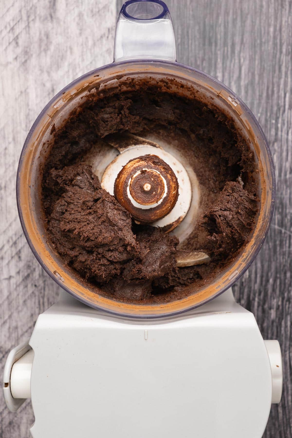 Dates and cocoa powder processed in a food processor.