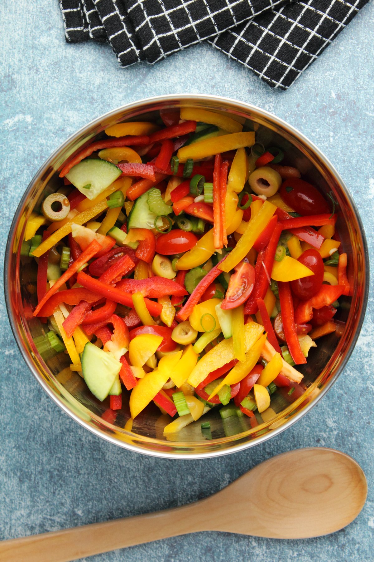 Fresh chopped vegetables in a mixing bowl. 