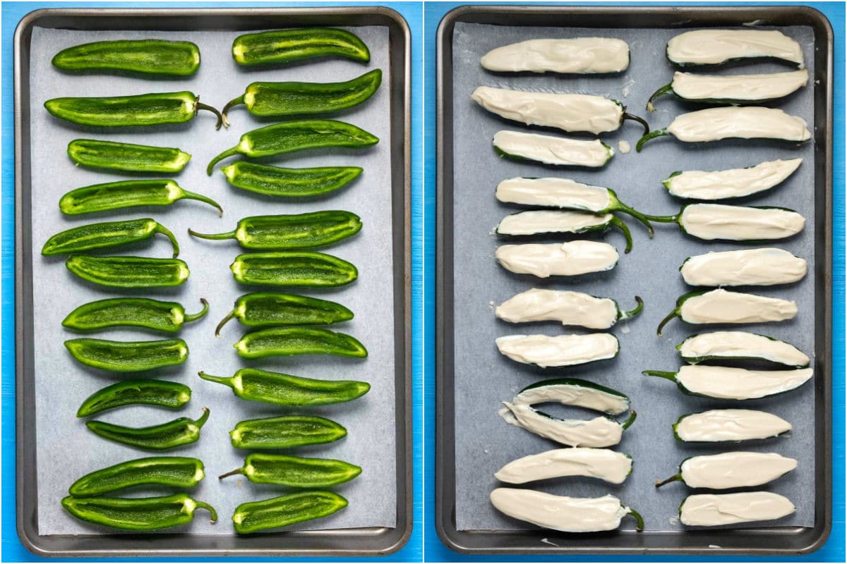 Jalapeño peppers stuffed with cream cheese on a parchment lined baking sheet.