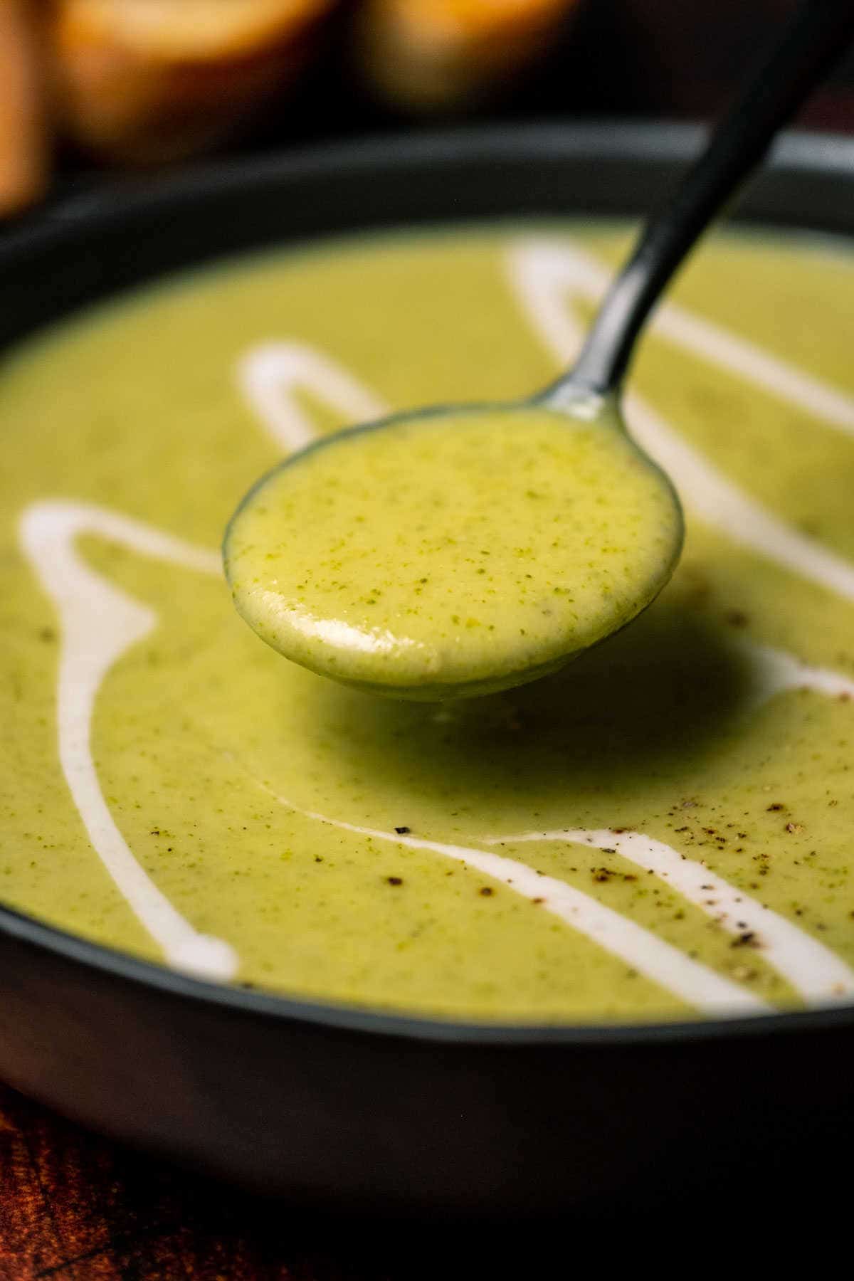 Spoonful of broccoli soup.