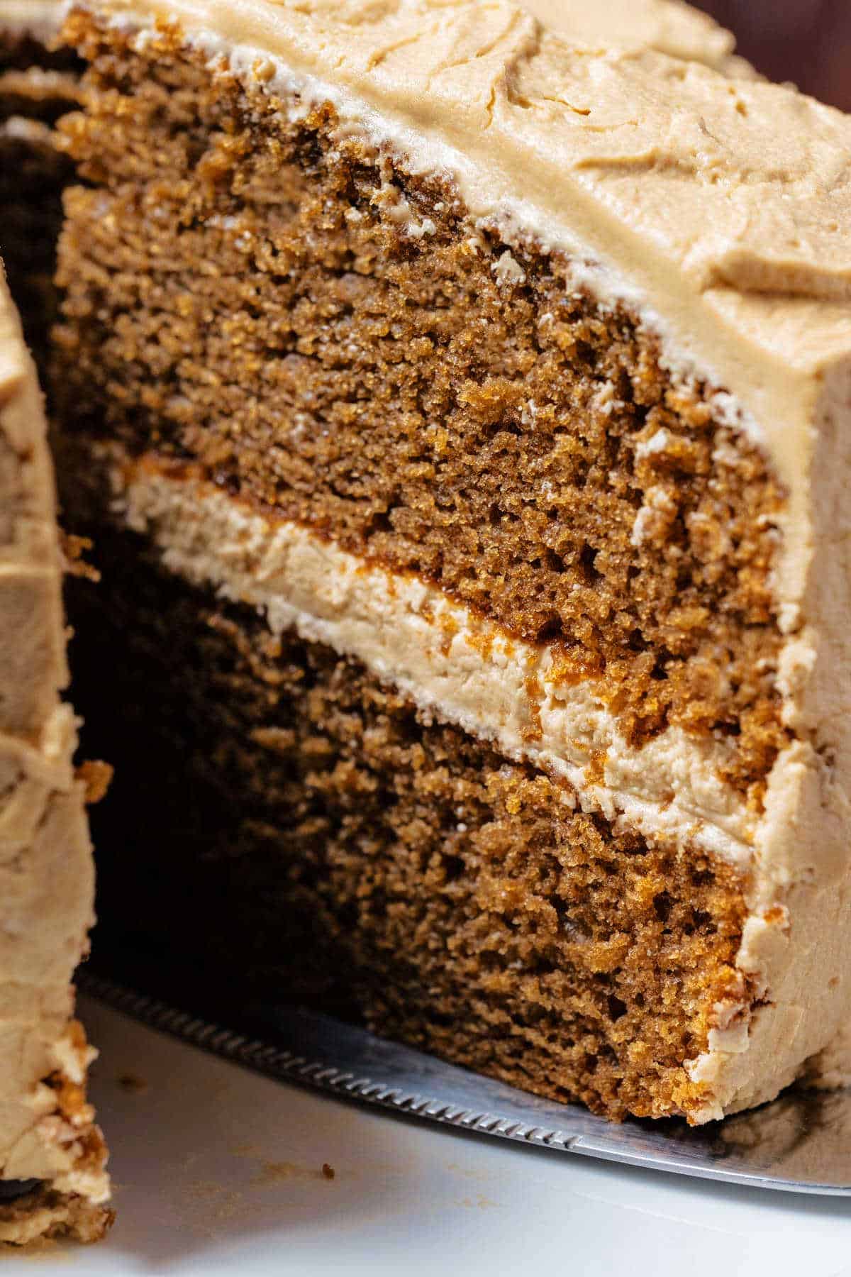 Slice of coffee cake on a cake lifter. 