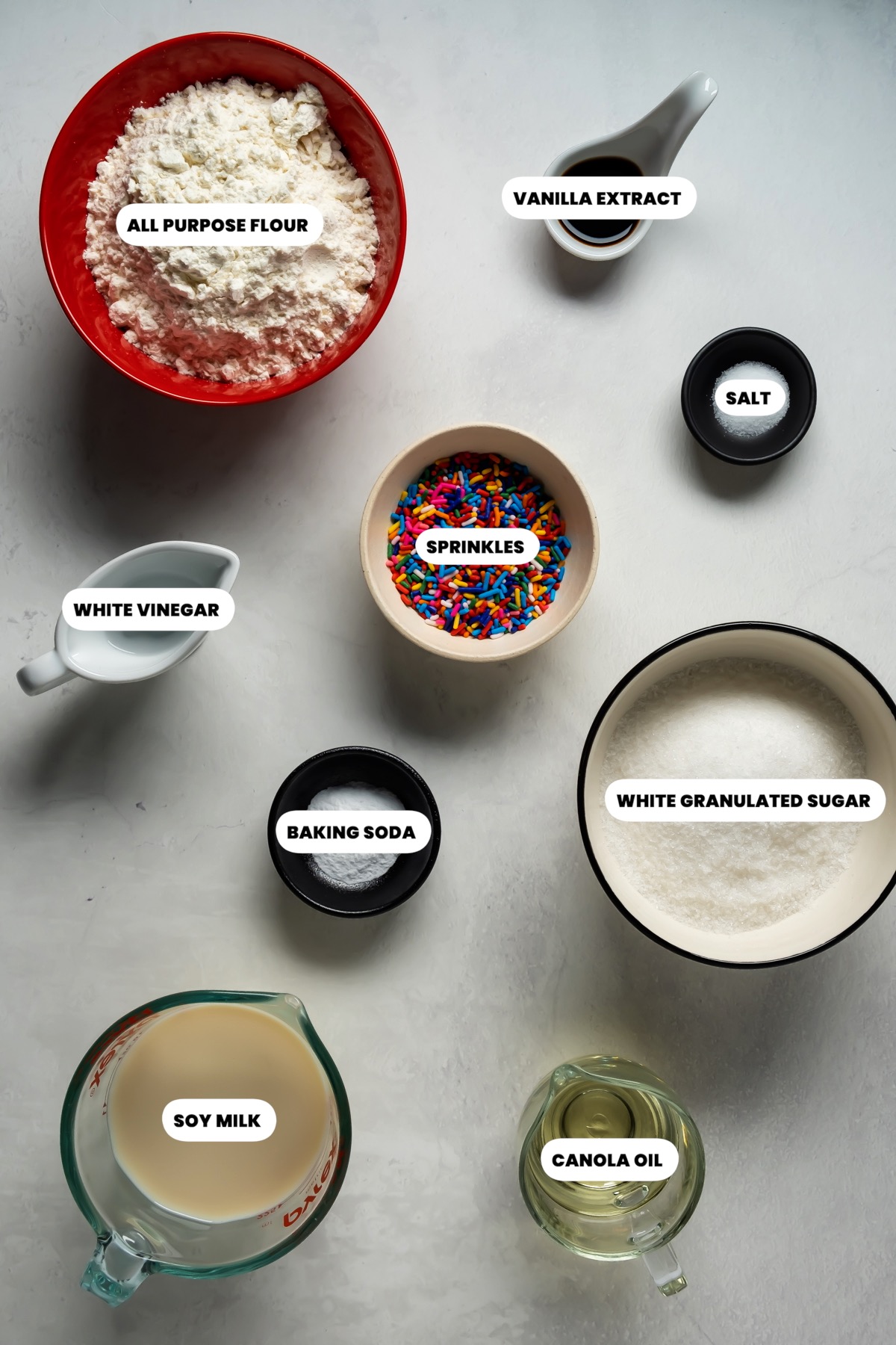 Photo of the ingredients needed to make vegan funfetti cupcakes.