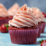 Vegan strawberry cupcake with frosting.