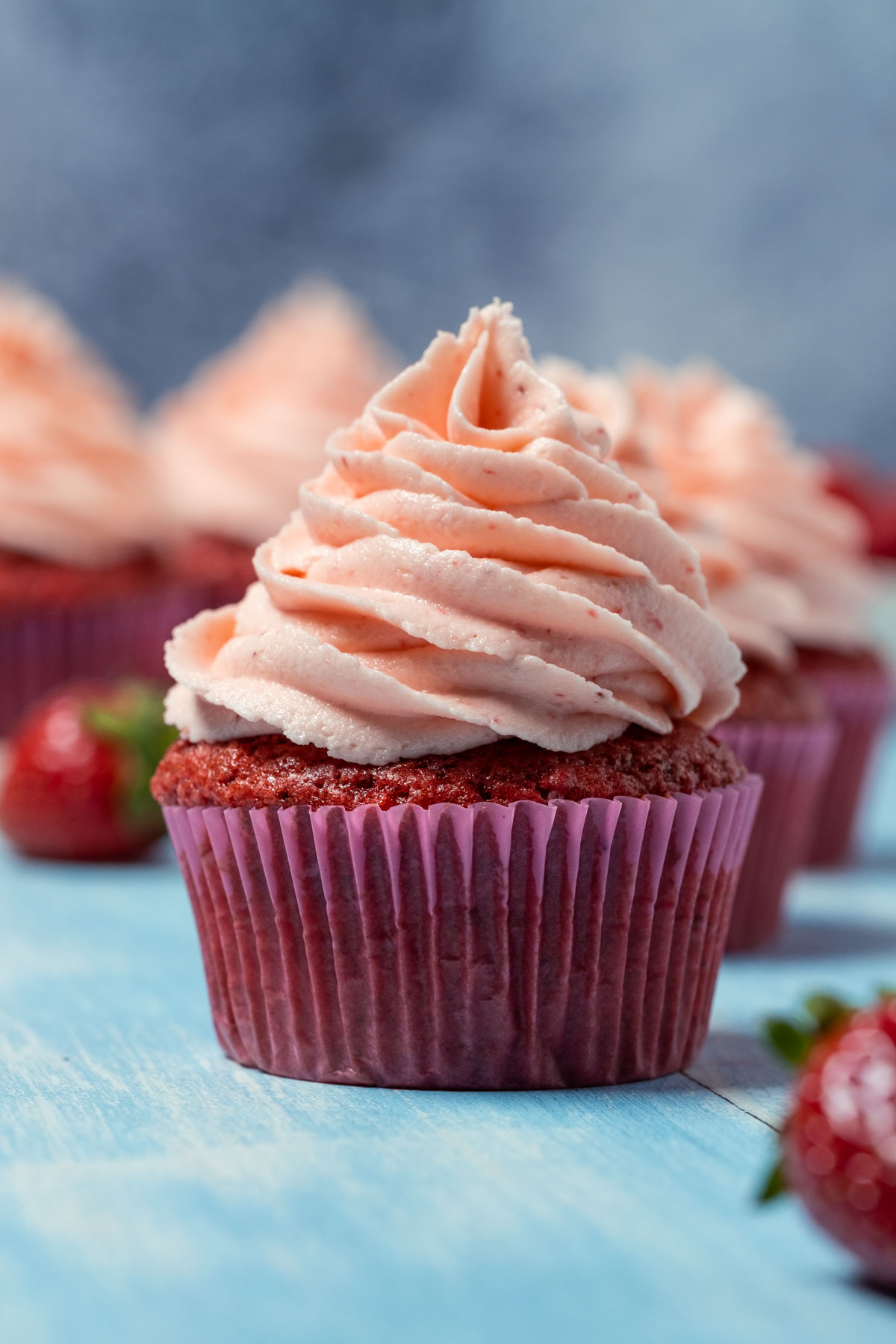 Vegan strawberry cupcake with frosting.