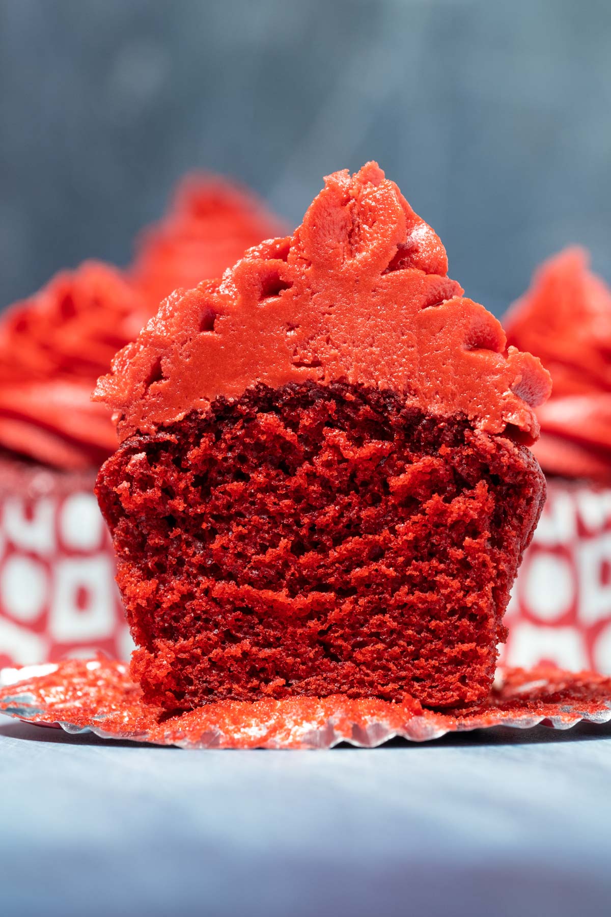 Vegan red velvet cupcake cut in half.