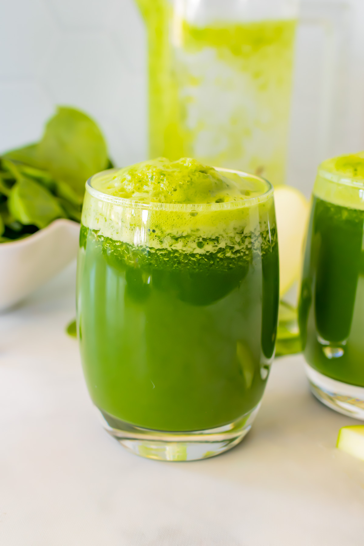 Glasses of green juice.