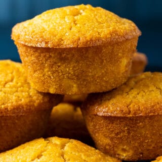 Vegan cornbread muffins in a stack.