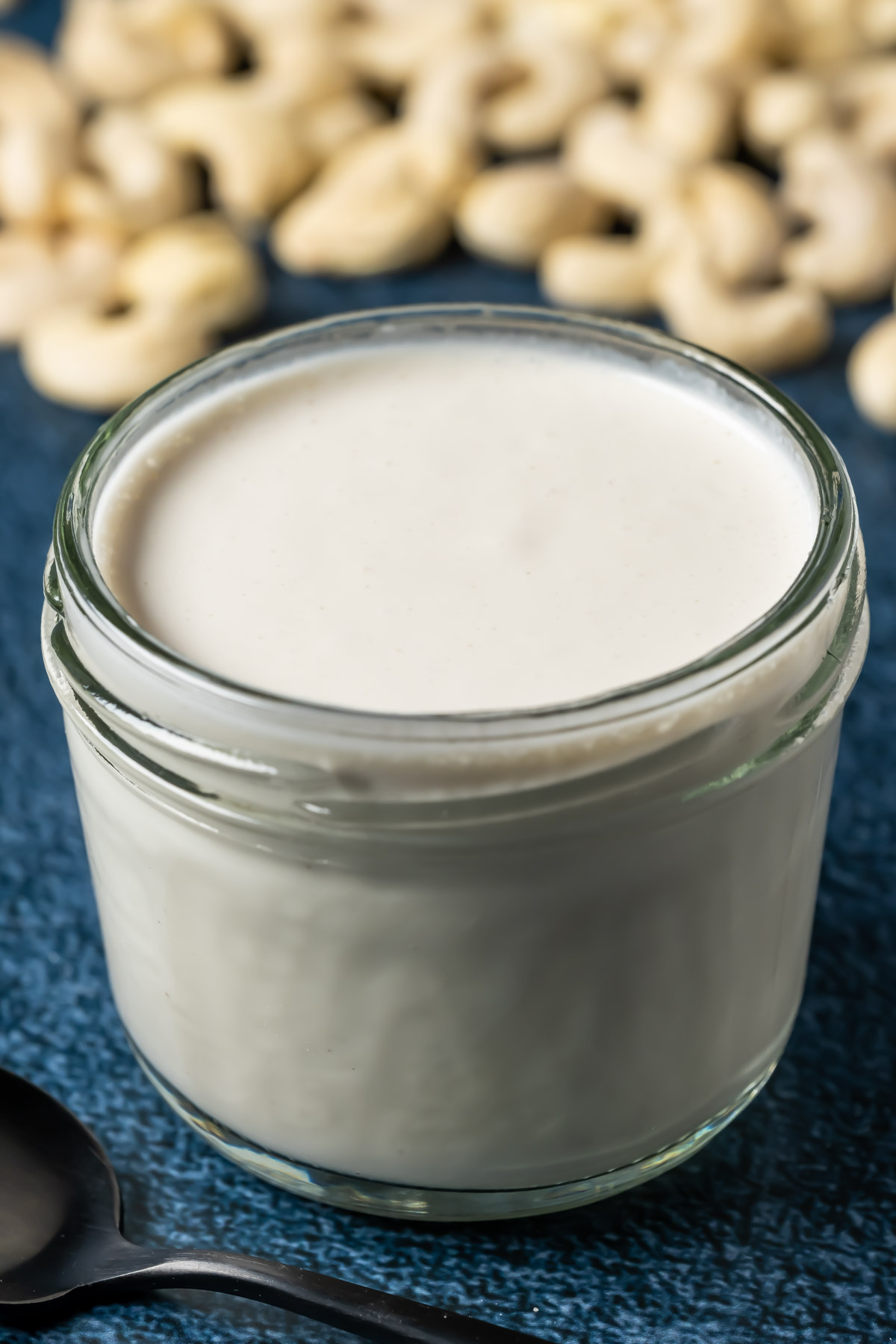 Vegan heavy cream substitute in a glass jar.