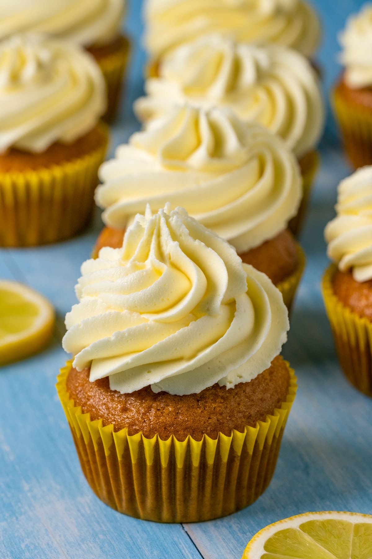 Vegan lemon cupcakes topped with lemon frosting. 
