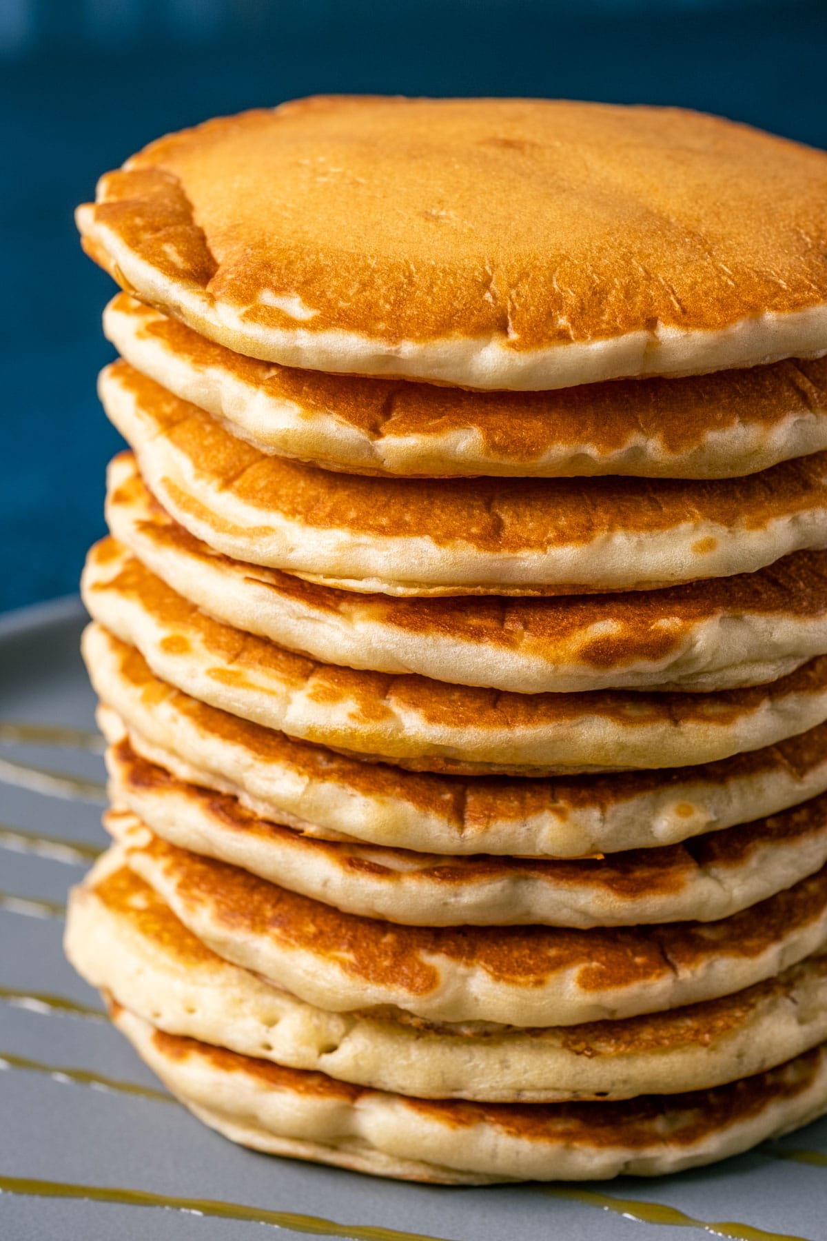 Stack of vegan buttermilk on a blue plate.