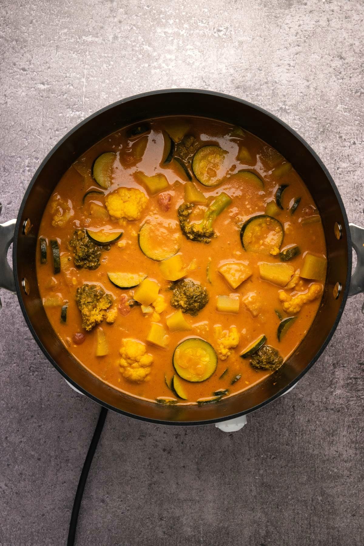 Cooked vegan curry in a pot.