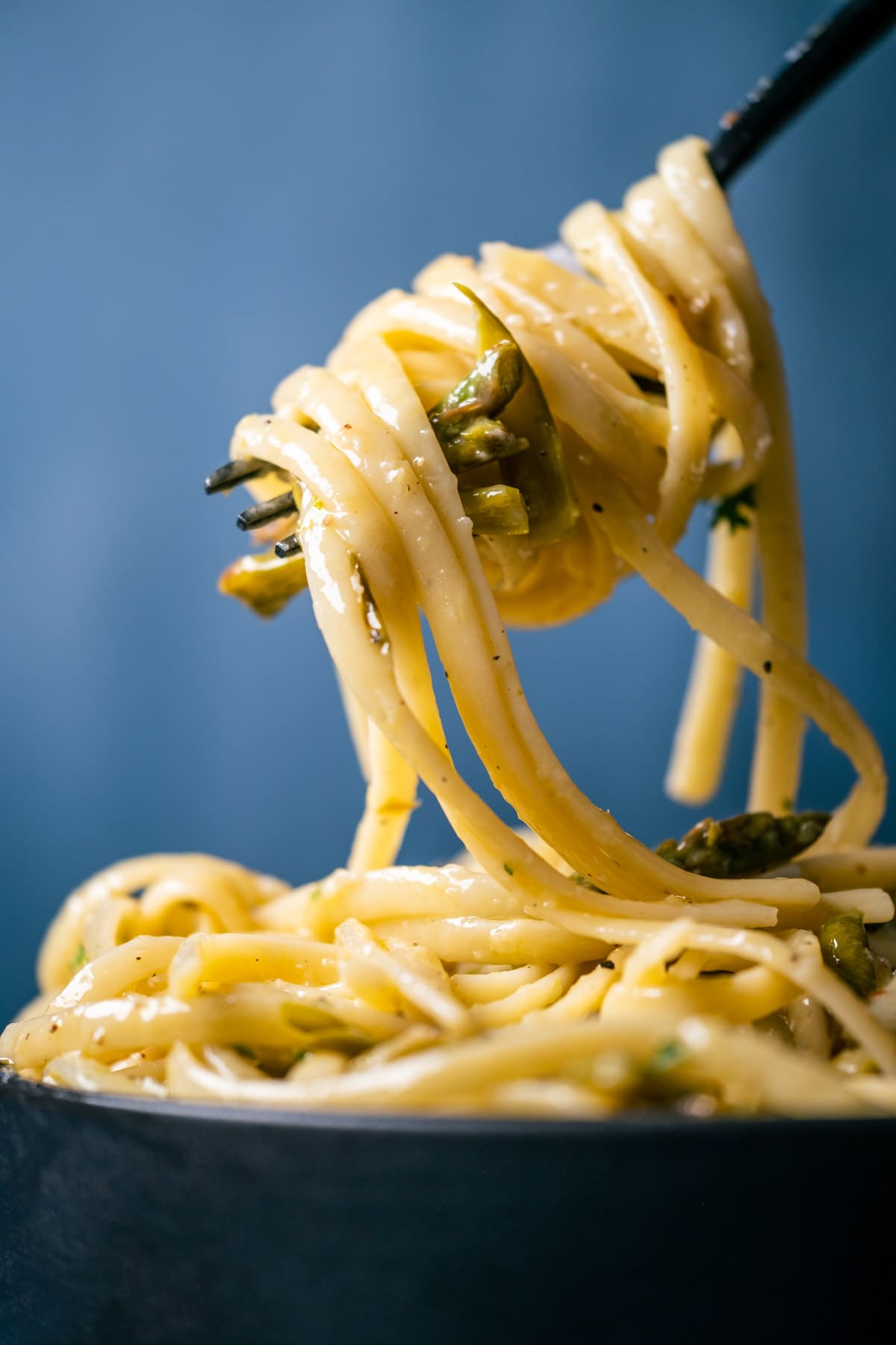 Forkful of vegan asparagus pasta.