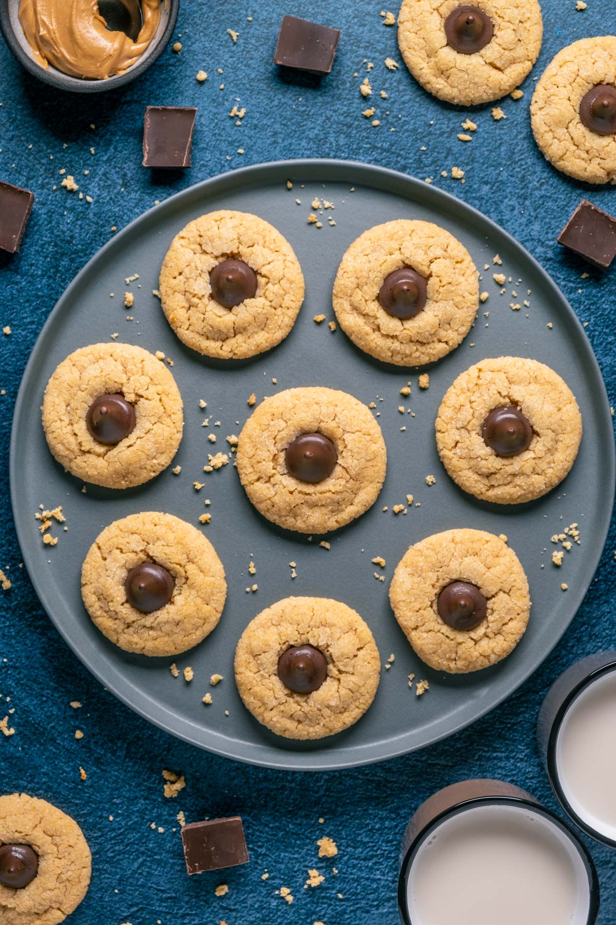 Vegan peanut butter blossoms on a gray plate. 