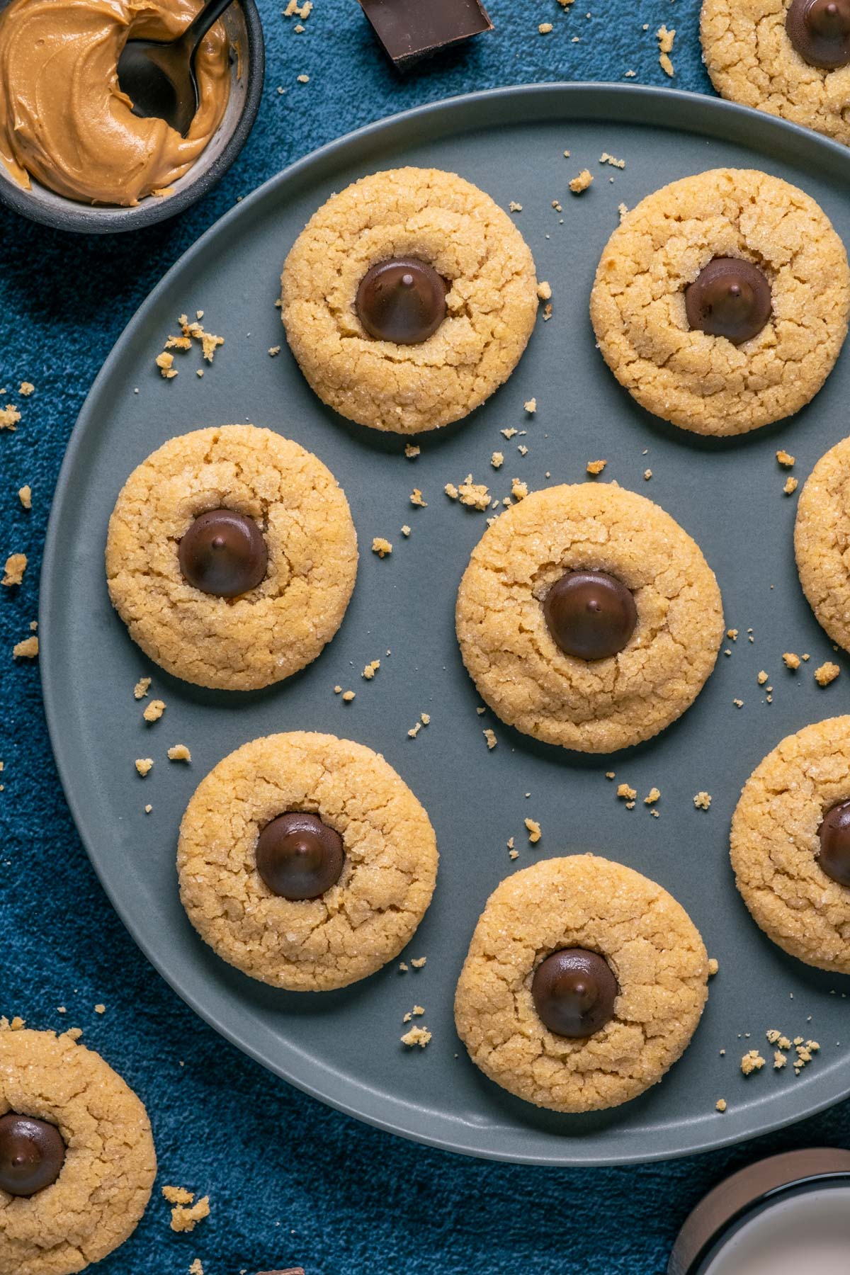 Vegan peanut butter blossoms on a gray plate.