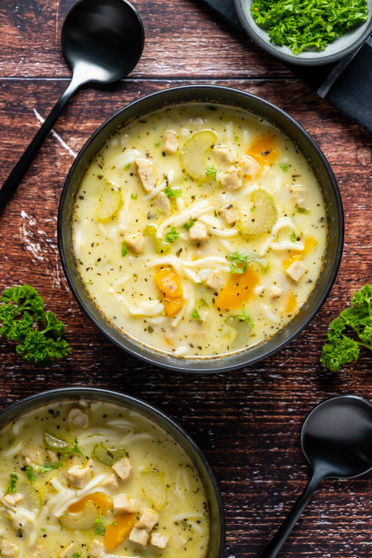 Vegan chicken noodle soup in bowls. 