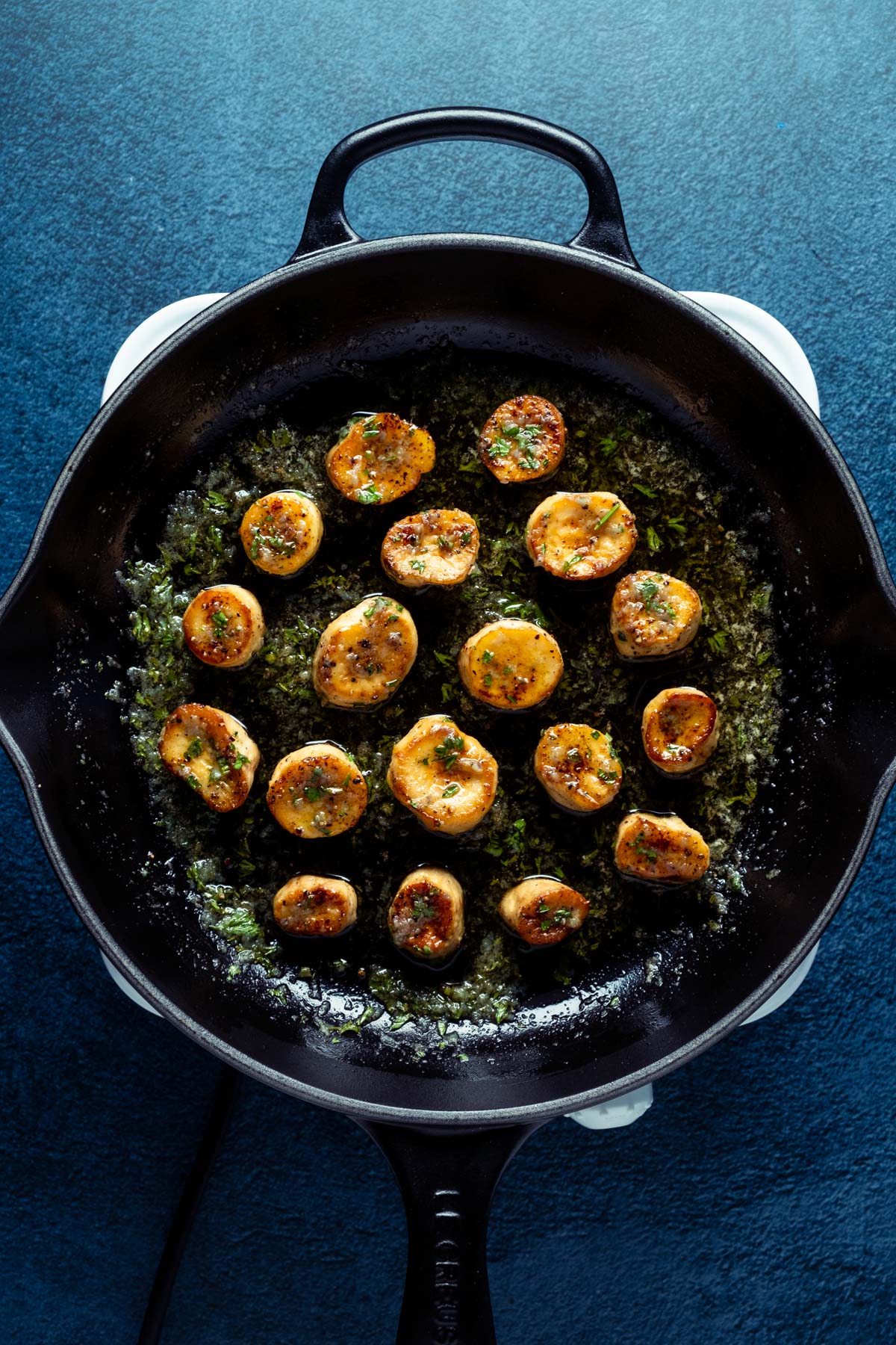 Vegan scallops in a frying pan.